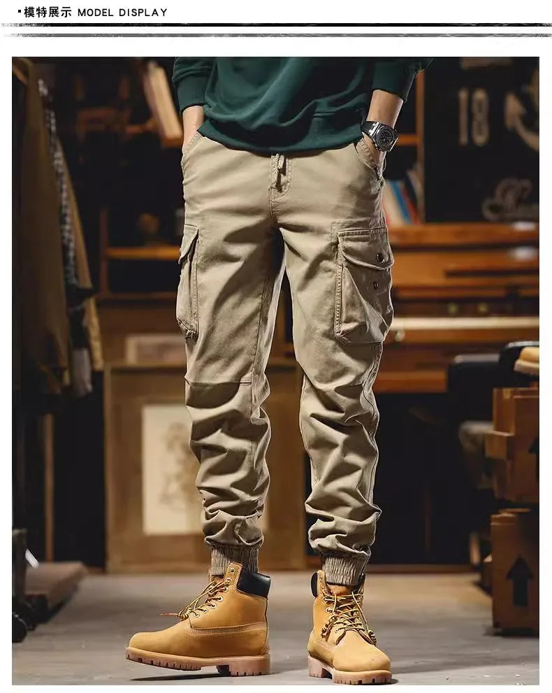 Pantalon cargo à poches zippées et élastiques chevilles