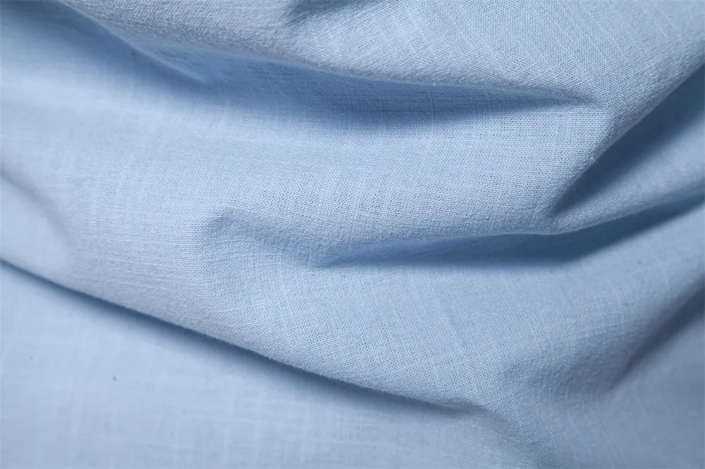 Chemise col mao ajustée – manches longues et boutonnière contrastée